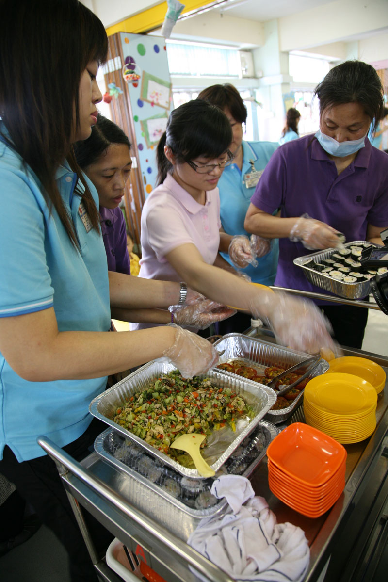 Teachers and staff are preparing food